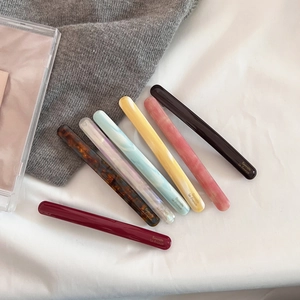 Set of eight assorted acetate barrette hair clips in elegant marble and solid colors