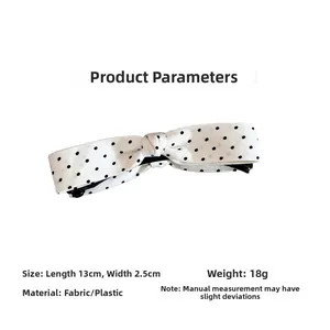 Detailed size specifications for polka dot bow banana clip showing 13cm length