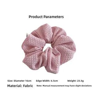 Pink quilted bubble knit scrunchie detail with dimensions 16cm diameter and 6.5cm width