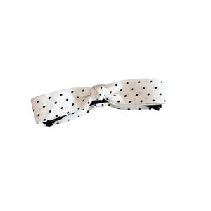 Sweet vintage white fabric banana hair clip with black polka dot bow design