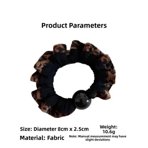 Detailed view of leopard print hair scrunchie with dimensions 8cm diameter and 10.6g weight
