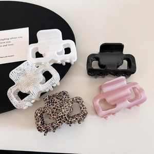 Five-piece set of square acetate hair claws in white, black, marble, and leopard patterns