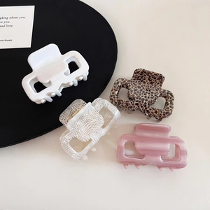 Square acetate hair claws set in leopard, white and pastel tones for elegant styling