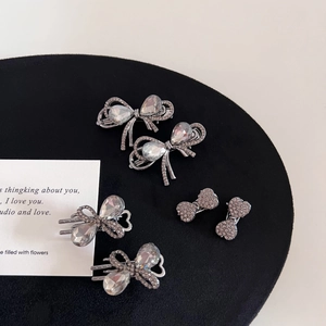 Macro view of gunmetal grey hair clips set with sparkling rhinestones and crystals