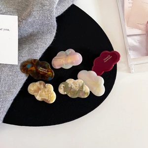 Cloud shaped acetate hair clips in six colors including tortoise shell and marble patterns
