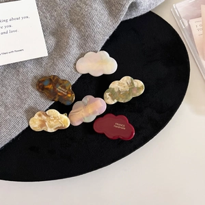 Set of 6 cloud-shaped acetate hair clips in tortoiseshell and marble patterns