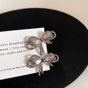 Gunmetal grey rhinestone bow hair clips for women with sparkling crystal teardrop details