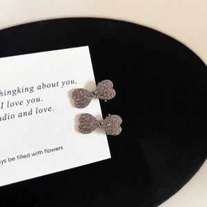 Gunmetal grey rhinestone bow hair clips for women with a vintage mini aesthetic