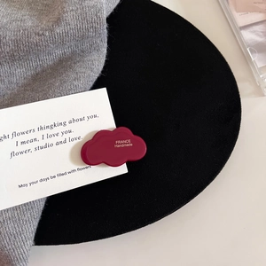 Deep burgundy cloud-shaped acetate hair clip featuring FRANCE Handmade engraving