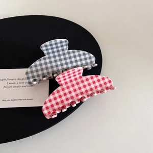 Elegant checkered acetate hair claw clips in blue and pink for women's hair styling