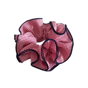 Gingham pattern scrunchie with contrast navy blue trim for stylish hair accessories