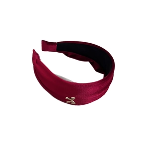 Elegant burgundy velvet headband with a golden metal bow for high cranial top look