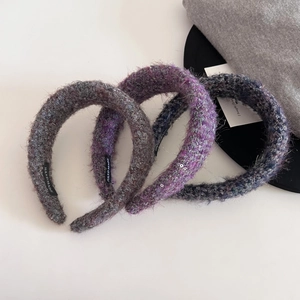 Three-piece tweed knit headbands in grey, blue, and purple with silver glitter thread