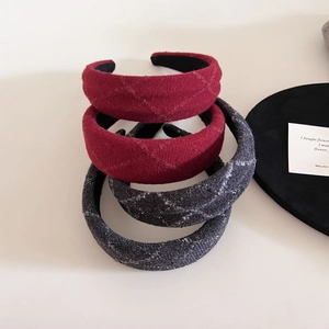 Minimalist red and gray plaid wool headband with padded wide-brim high top design