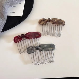 Three acetate bow hair combs in amber, red and grey with gold France Handmade logo