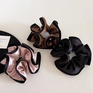 Three-piece large satin scrunchie set in champagne, brown, and black with velvet edging