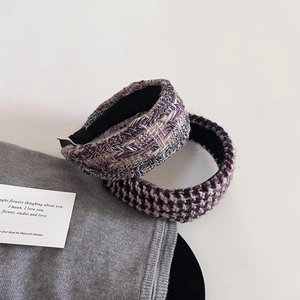 Detail of tweed woven headbands in lavender green and navy red with anti-slip inner lining