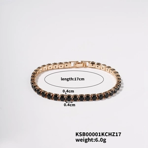 Detailed view of a gold tennis bracelet with 17cm length and black cubic zirconia stones