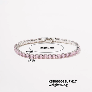Macro detail of silver tennis bracelet with 0.4cm pink square-cut zircon stones and clasp
