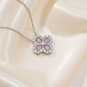 Chic clover necklace with pink water drop gemstones and sparkling white zircons