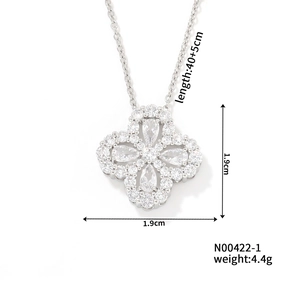 Detail view showing four-leaf clover necklace dimensions 1.9cm x 1.9cm and 4.4g weight