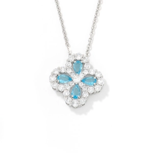 Silver four-leaf clover necklace with pear-cut blue crystals and white cubic zirconia accents