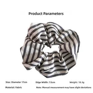 Detailed dimensions of the black and white striped fabric scrunchie, 17cm diameter accessory