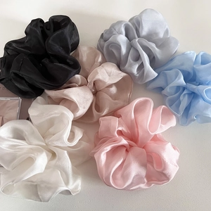 Set of 6 glossy organza scrunchies in pastel colors for high-end hairstyling