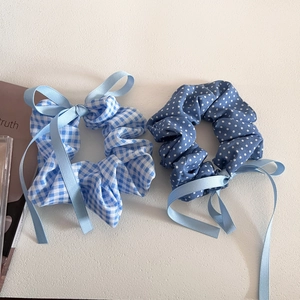 Blue plaid and polka dot hair scrunchies with satin ribbons for women's ponytails