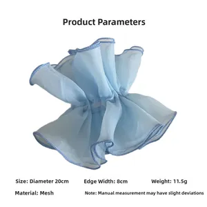 Detail showing 20cm light blue mesh scrunchie with layered ruffles and soft texture