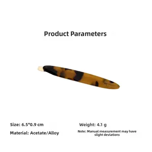 Detail of tortoise shell acetate hair clip showing 6.5x0.9cm size and 4.1g weight