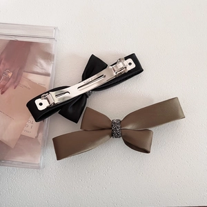 Elegant satin bow hair clips with rhinestones in black and olive brown with metal clip