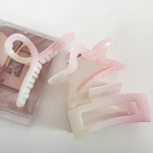 Pearlescent gradient hair clips in star and rectangular shapes for elegant hair styling
