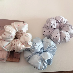 Three-piece satin polka dot scrunchie set in white, light blue, and lavender colors