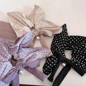 Vintage polka dot bow hair ties set in beige, purple, and black with pearl pendants