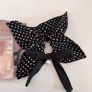 Vintage black polka dot bow hair scrunchie with elegant pearl pendant and soft fabric