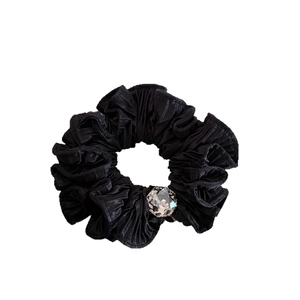 Elegant black pleated scrunchie with a large sparkling crystal for ponytail hairstyles