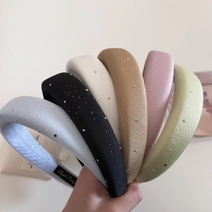 Sparkling satin padded headbands set in six elegant Morandi colors with glitter details