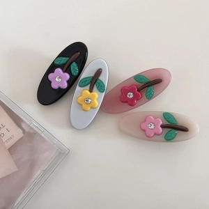 Set of four acetic acid hair clips with rhinestone floral design in black blue pink beige