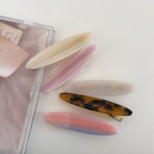 Elegant 5-piece acetate hair clip set in oval shapes and various pastel marble patterns