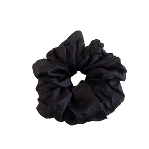 Elegant black mesh scrunchie with polka dots for chic ponytails and buns hair accessories