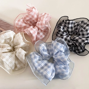 Scrunchie a quadretti con bordi trasparenti in quattro colori pastello per donna