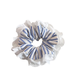 Blue and white striped scrunchie with lace edge for ponytails and bun hairstyles