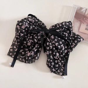Floral chiffon bow hair claw with long black ribbons and elegant white pearl pendants