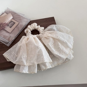 Vintage beige lace scrunchie with floral eyelet embroidery and layered ruffle design