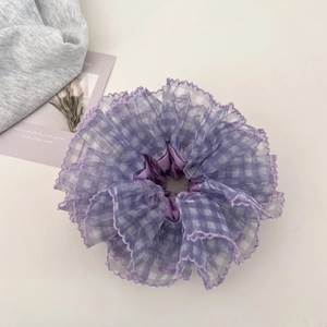 Elegant purple mesh scrunchie with white grid pattern and ruffled lace trim for hair