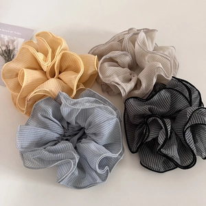 Set of four pastel plaid chiffon oversized scrunchies with elegant ruffled edges for women