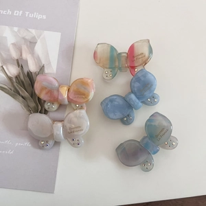 Chic acetate butterfly hair clips with rhinestones in four elegant marble colors