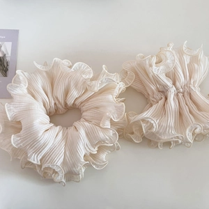 Elegant ruffled off-white oversized scrunchies with pleated edge for ponytails