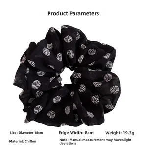 Detail showing 18cm large black chiffon scrunchie with white polka dots and size dimensions